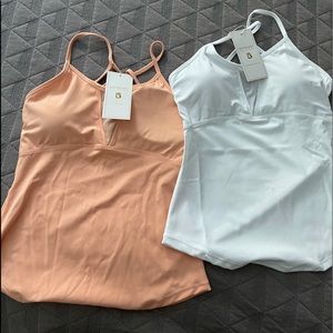 ***2****Buffbunny Cycle tank tops.